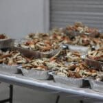Piles of Cooked Crab in Aluminum Trays